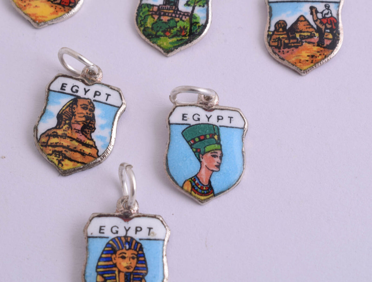 9 Vintage Revival Egyptian Enamel mini Pendants-very rare-Tut-Pyramids-Sphinx